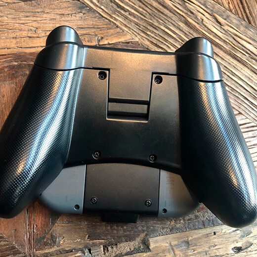 Подзаряжающий держатель Nintendo Switch Joy-Сon Pro Charging Grip купить